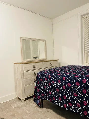 a room with a dresser