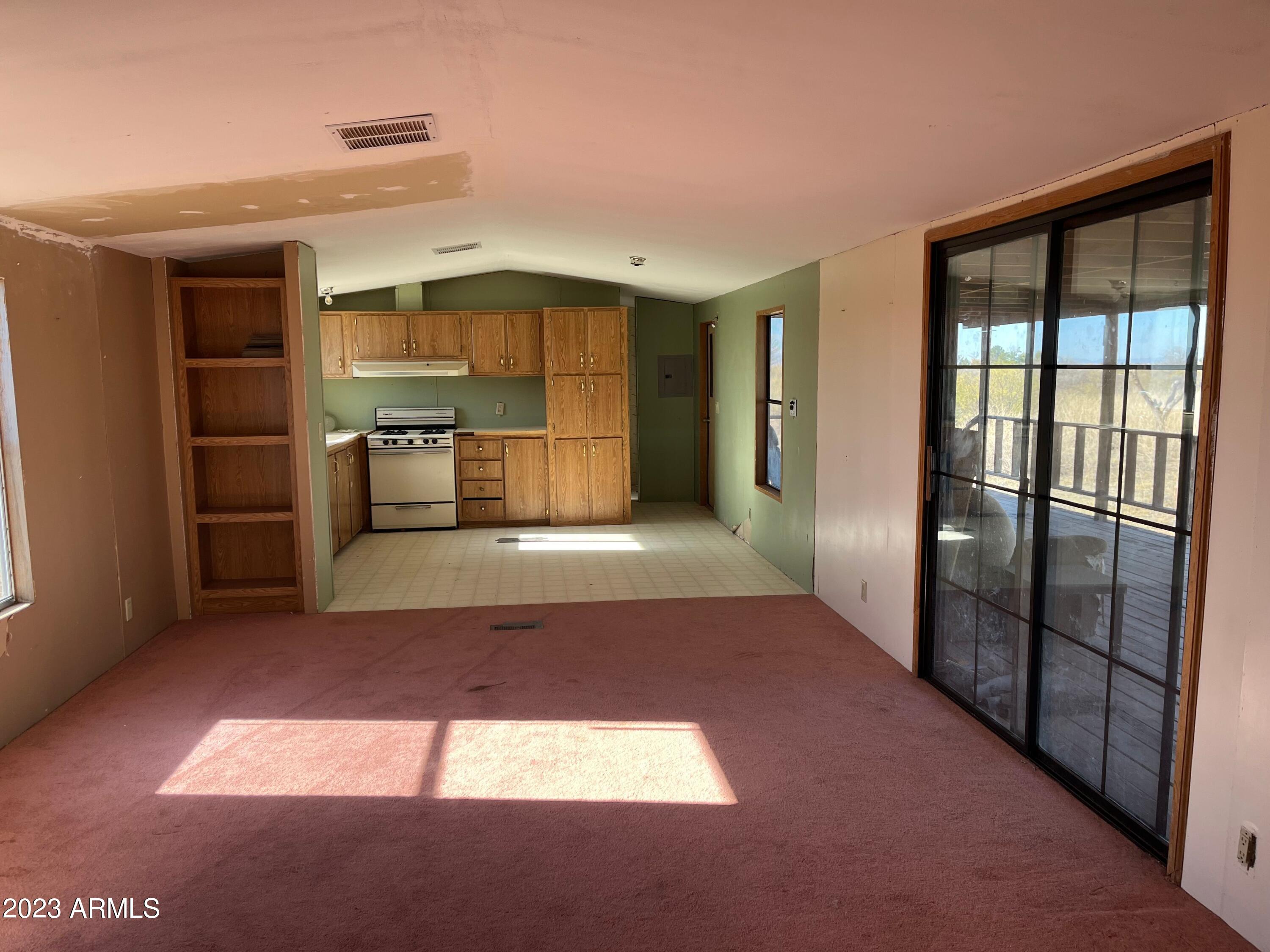 2902 Applewhite Drive Douglas, AZ 85607 - Photo 2 of 11 a living room with a large window