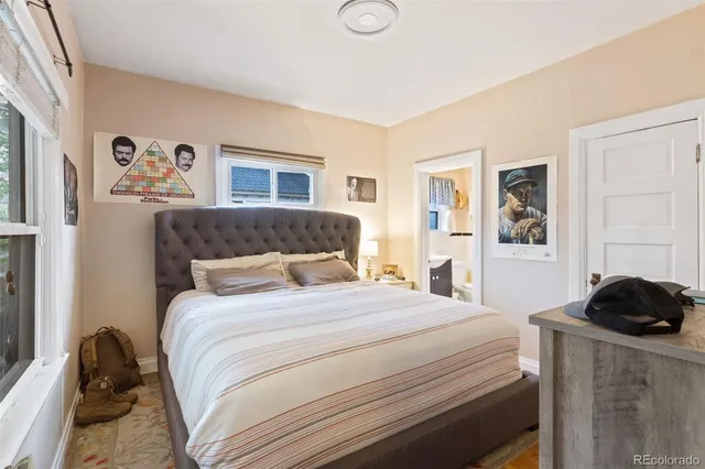 a bedroom with a bed and a cabinets