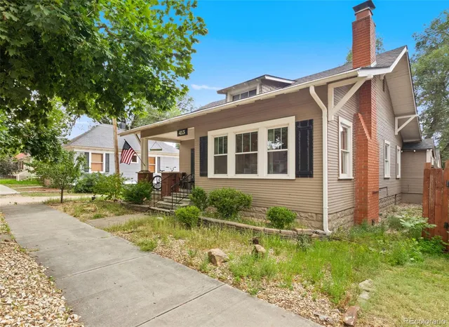 a front view of a house with swimming pool