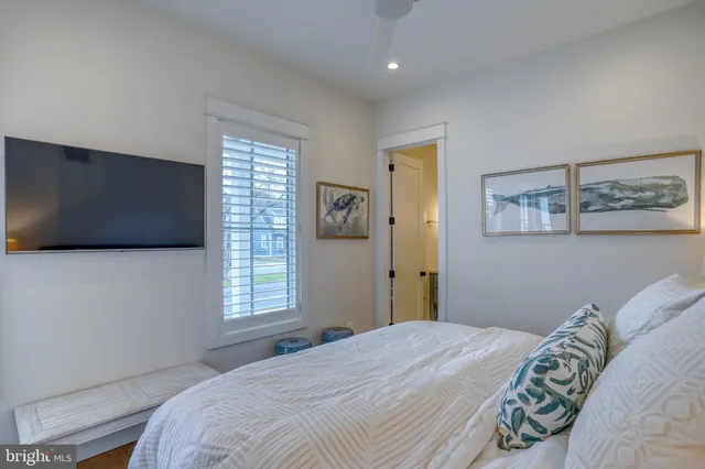 a bathroom with a double vanity sink and mirror