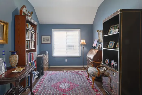 a room with furniture and a window
