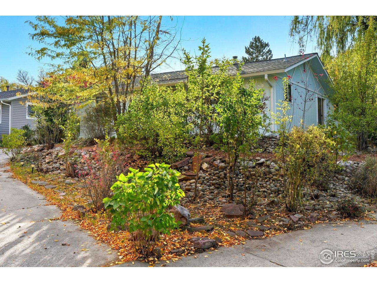 4559 Beachcomber Court Boulder, CO 80301 - Photo 18 of 22 a view of a garden with a house
