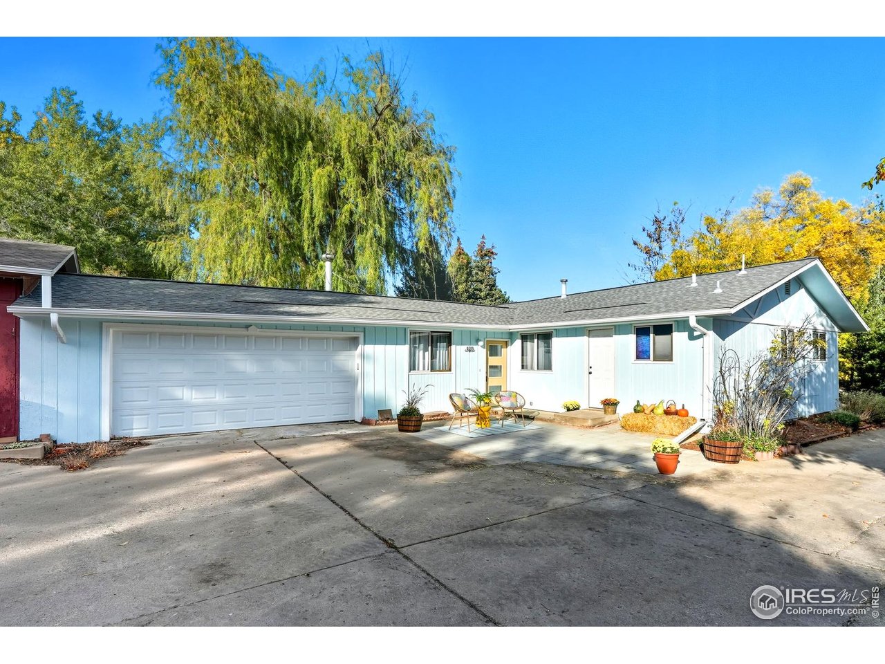 4559 Beachcomber Court Boulder, CO 80301 - Photo 3 of 21 Sunny patio and attached two car garage.