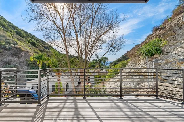 a view of outdoor space with deck and yard