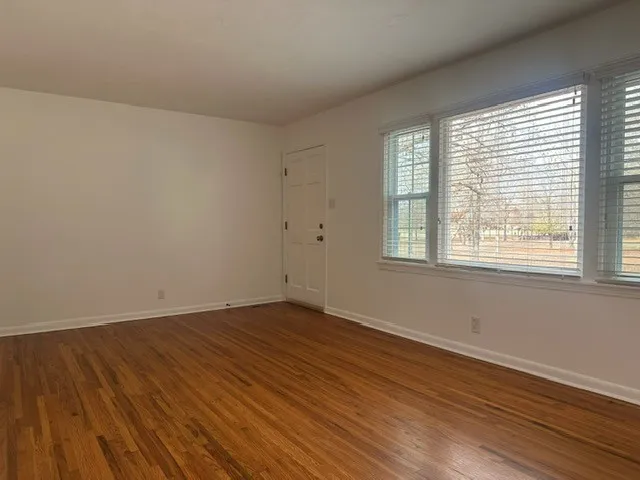 a stove top oven sitting inside of a kitchen