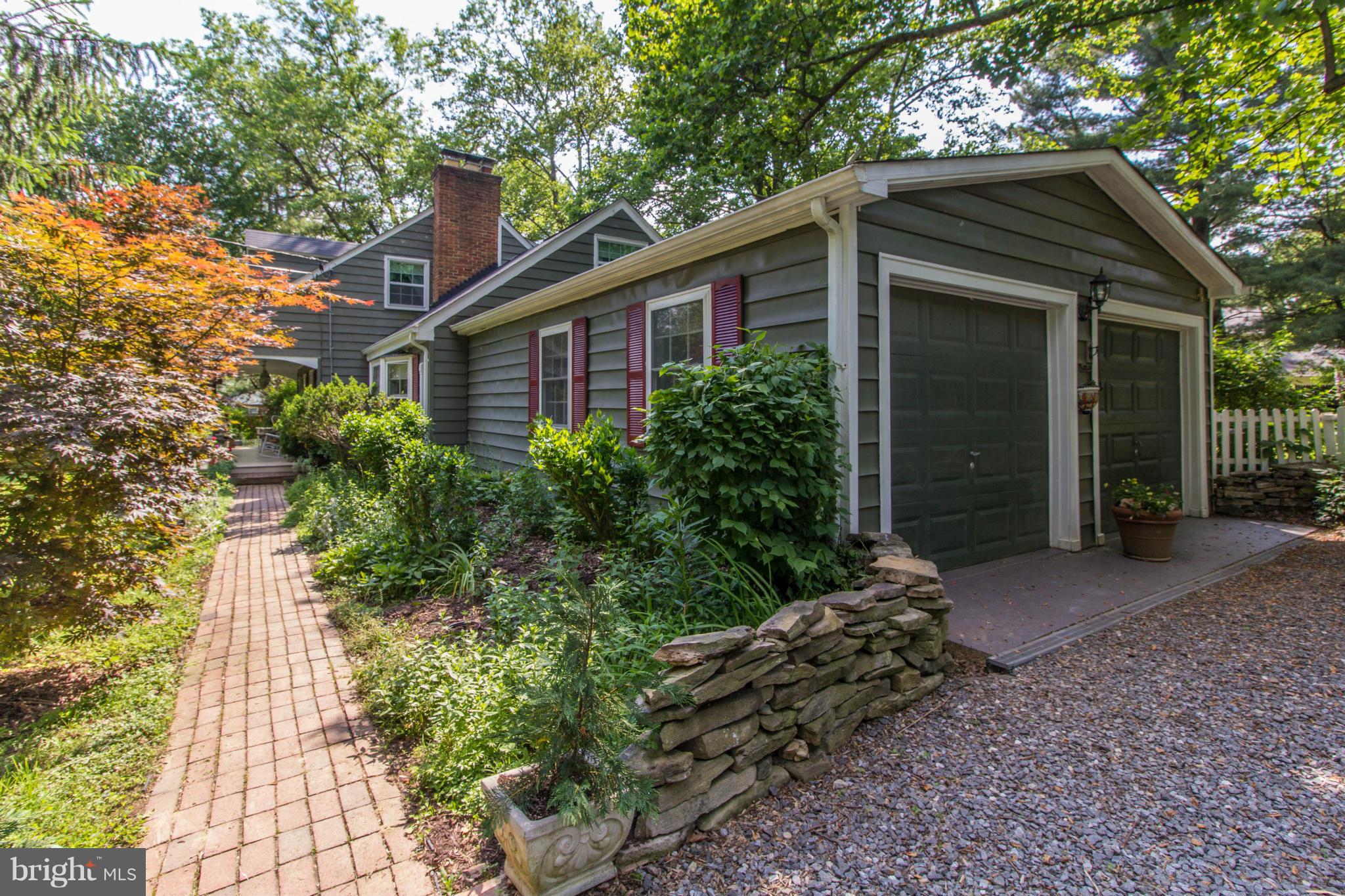 4221 Briars Road Olney, MD 20832 - Photo 3 of 30 a front view of a house with a yard