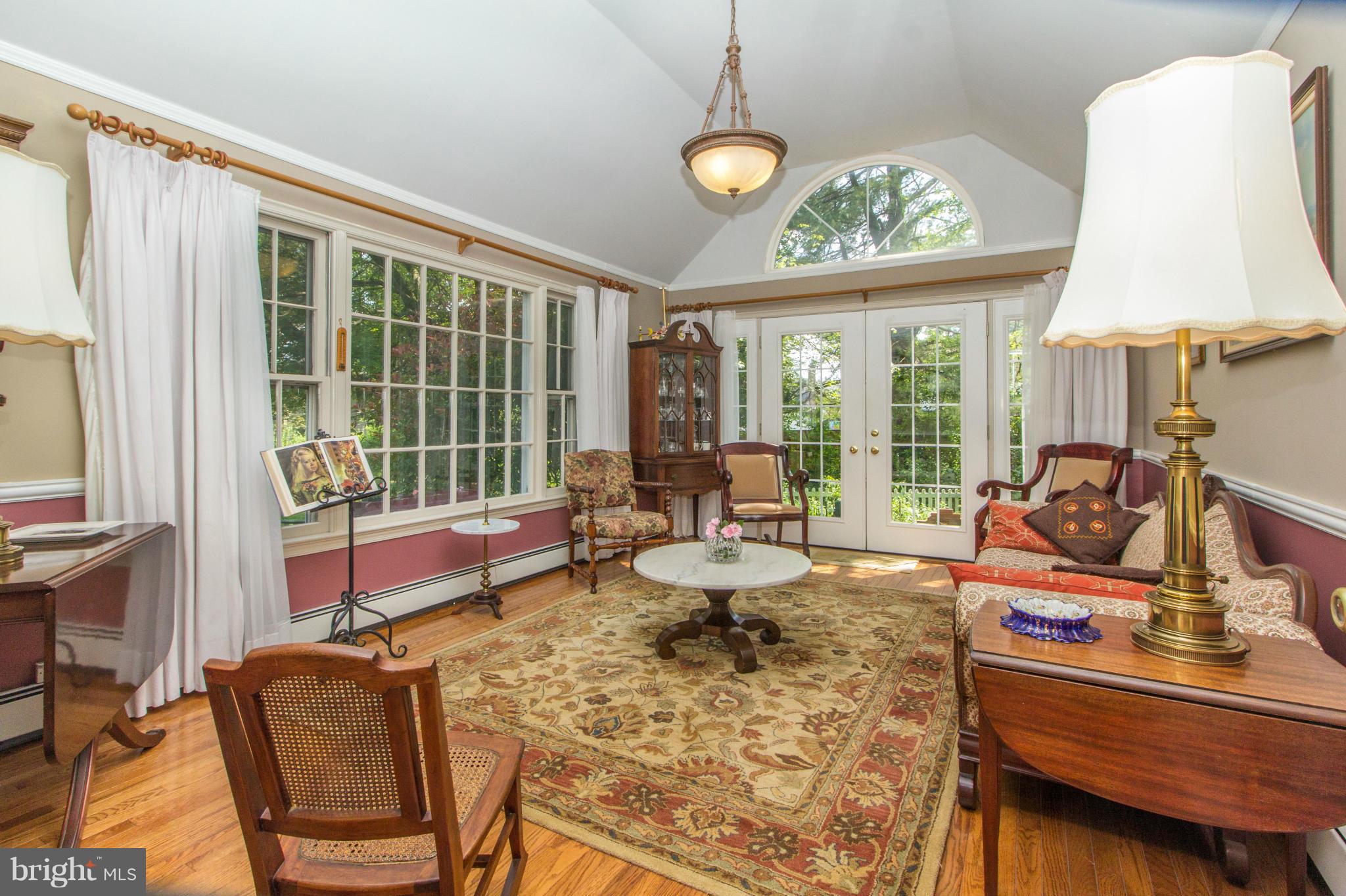 4221 Briars Road Olney, MD 20832 - Photo 8 of 30 a room with furniture and a large window