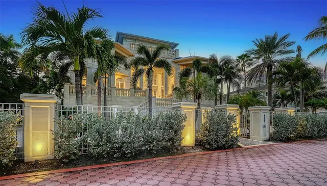 a living room with furniture fireplace and a flat screen tv