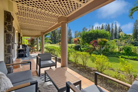 a view of a chairs and tables in the patio