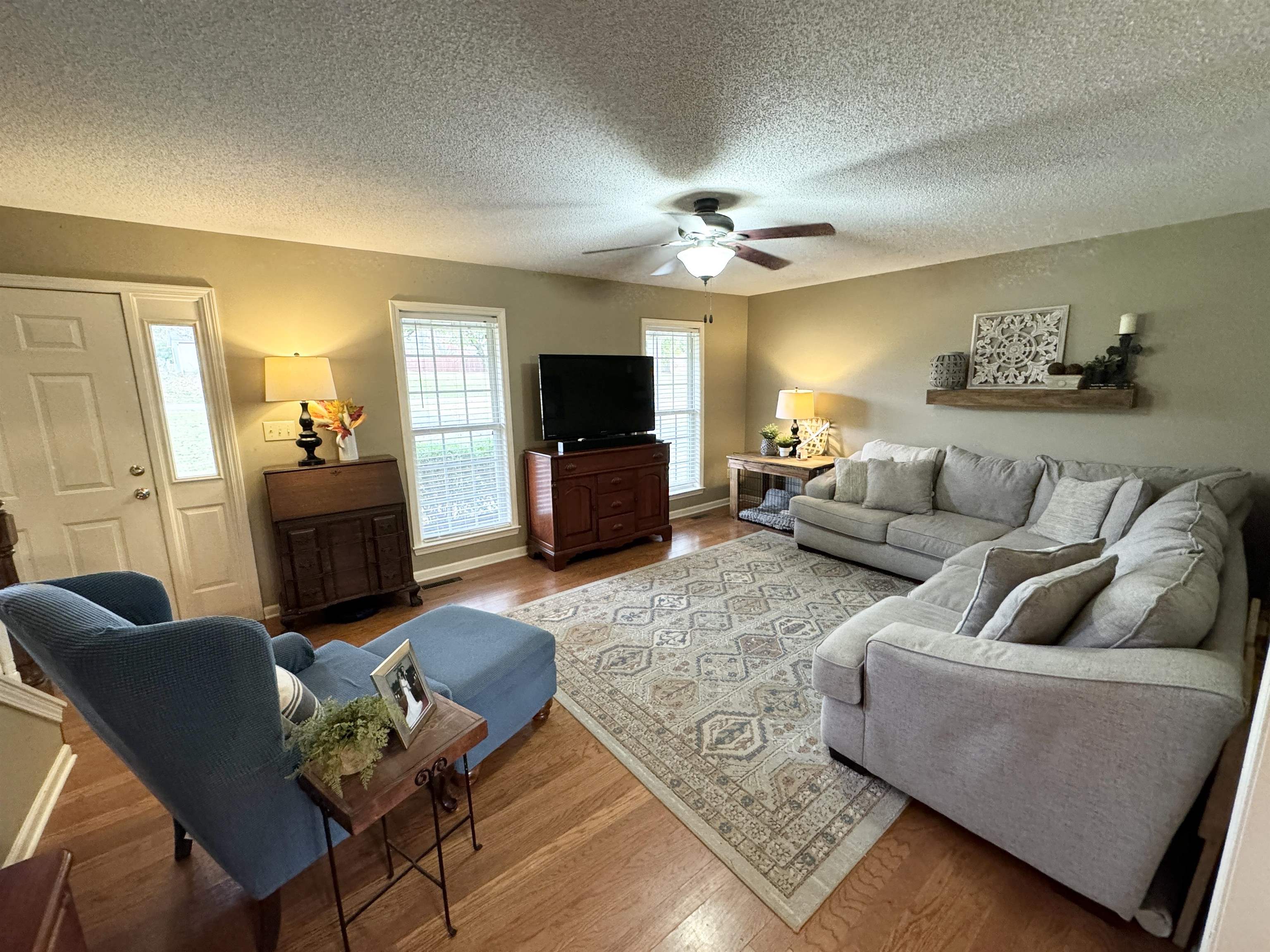 47 Chisholm Lake Road Ripley, TN 38063 - Photo 17 of 26 a living room with furniture and a flat screen tv