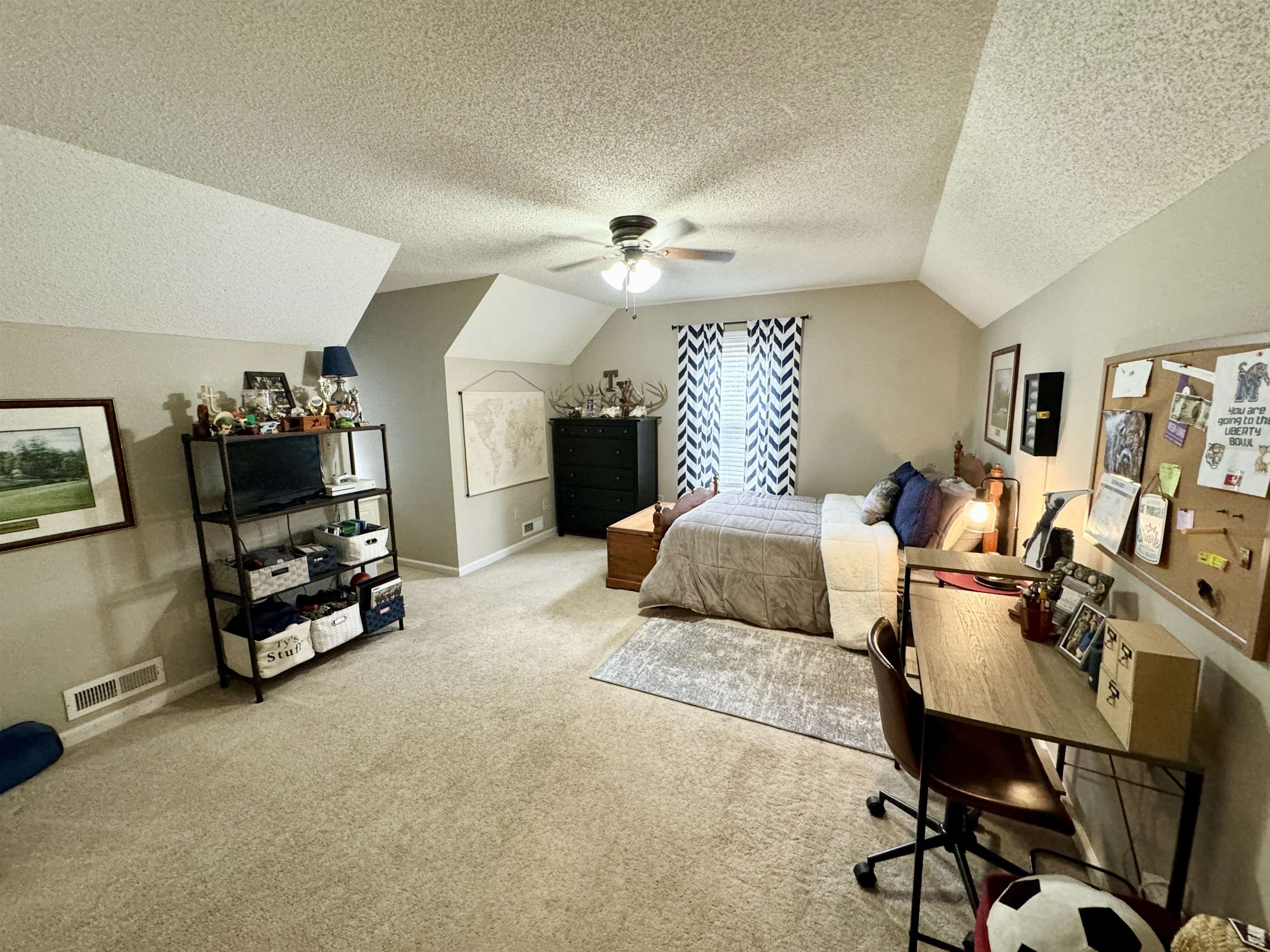 47 Chisholm Lake Road Ripley, TN 38063 - Photo 19 of 26 a bedroom with furniture and a gym equipment