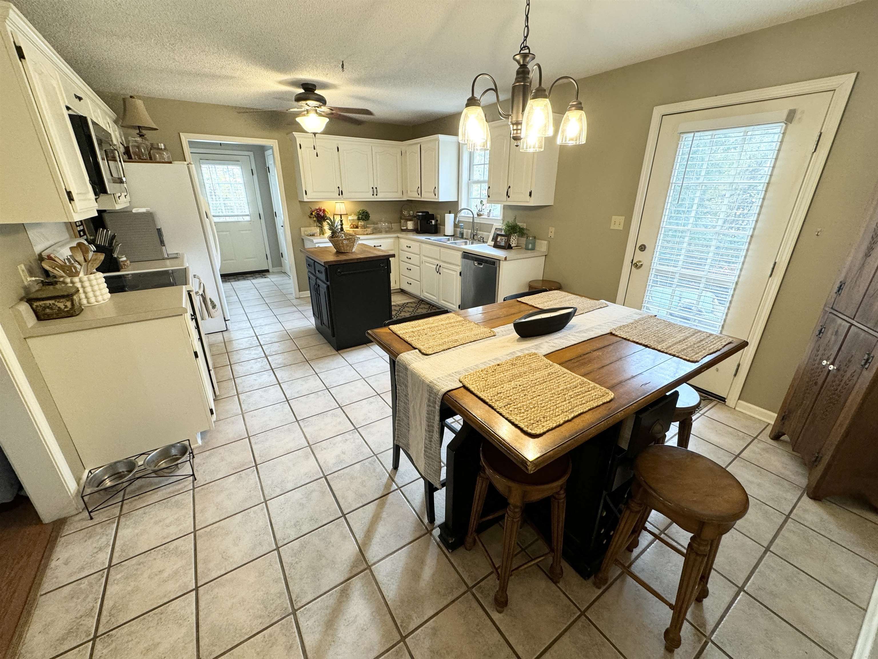 47 Chisholm Lake Road Ripley, TN 38063 - Photo 8 of 26 a view of a dining room with furniture and window
