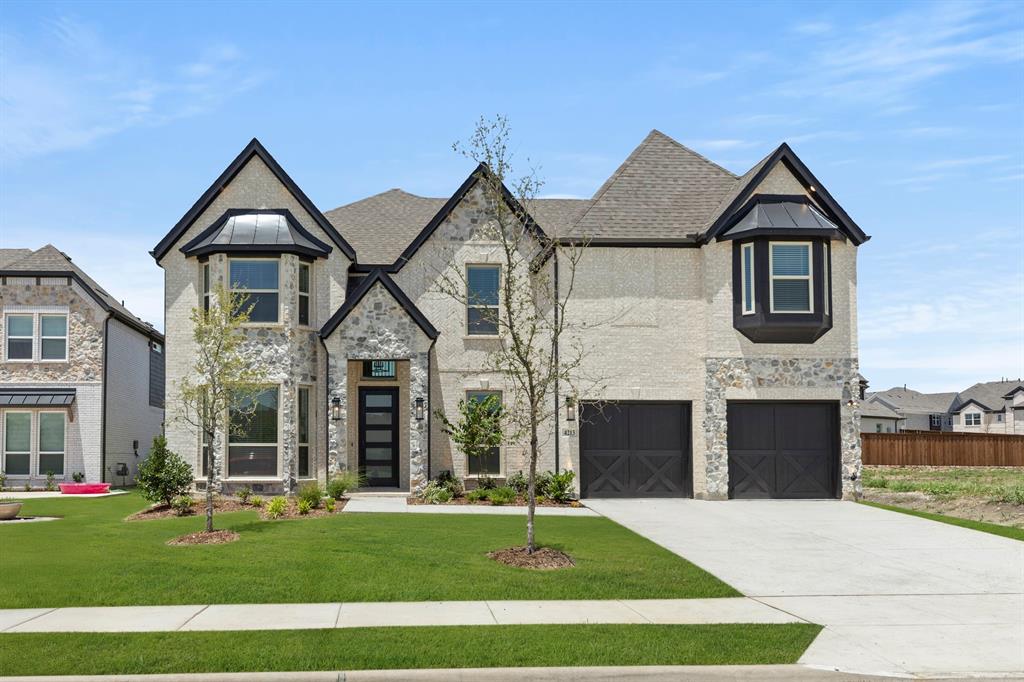 4213 Bellview Way Celina, TX 75009 - Photo 1 of 29 a front view of a house with a yard and garage