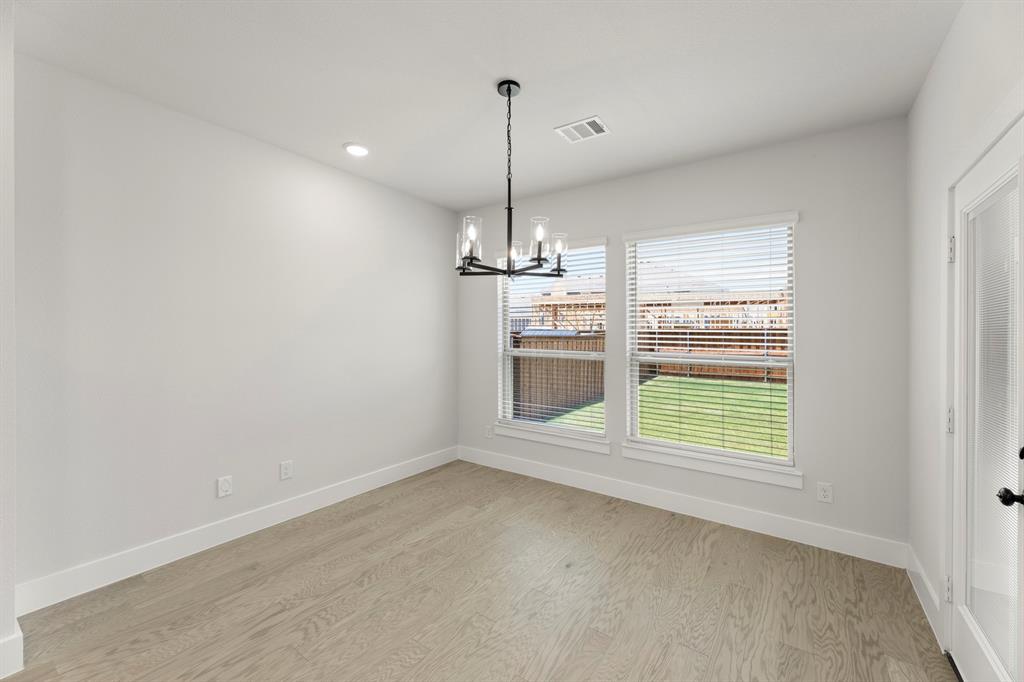 4213 Bellview Way Celina, TX 75009 - Photo 13 of 29 a view of a room with windows