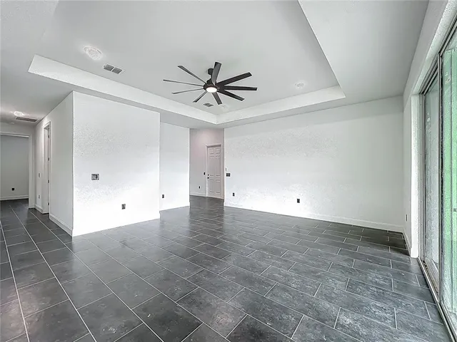 a view of an empty room and window