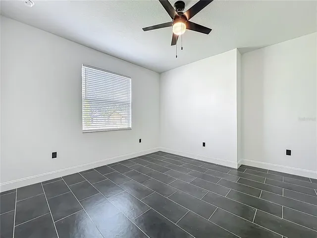 an empty room with white walls and white walls