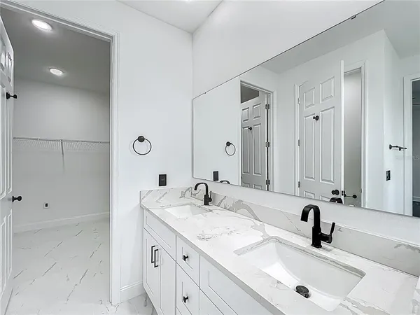an empty space with white walls and white walls