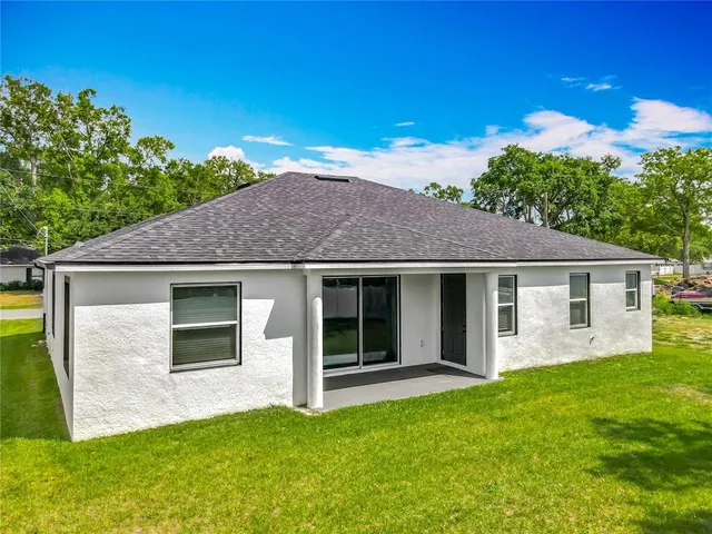 a view of a city with an ocean view