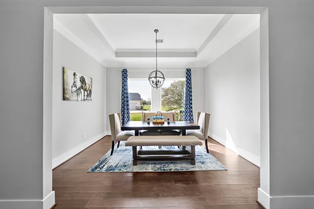a living room with furniture and window