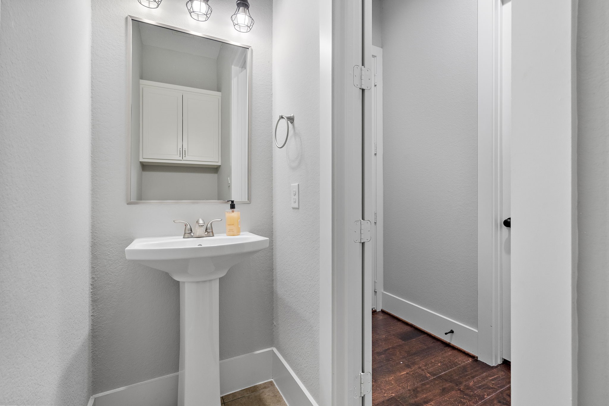 127 Cavalry Trail Drive Rosharon, TX 77583 - Photo 14 of 37 a bathroom with a sink and mirror