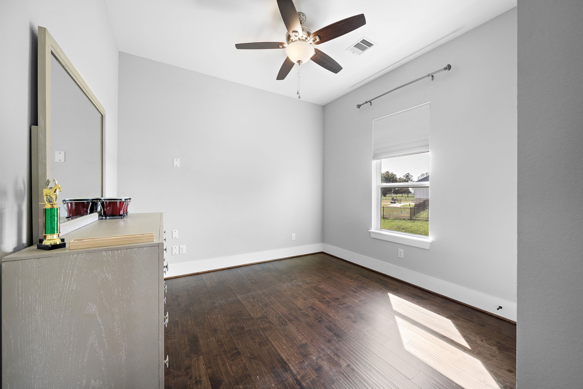 127 Cavalry Trail Drive Rosharon, TX 77583 - Photo 21 of 37 a view of an empty room with a window