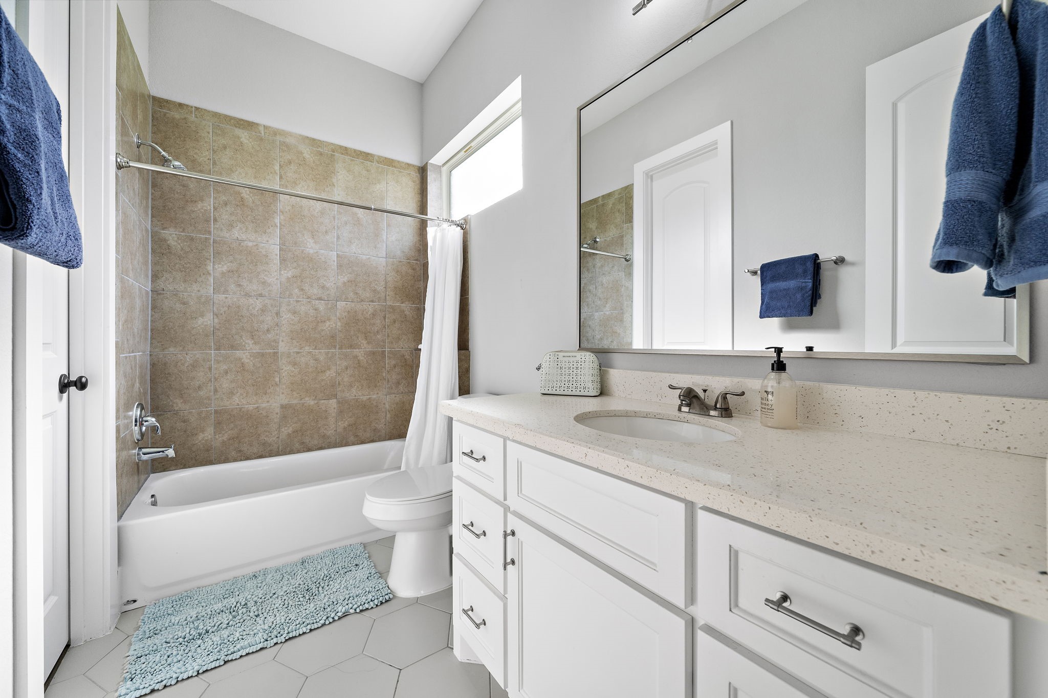 127 Cavalry Trail Drive Rosharon, TX 77583 - Photo 27 of 37 a bathroom with a granite countertop sink toilet and shower