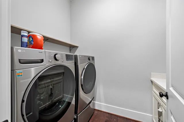a utility room with dryer and washer