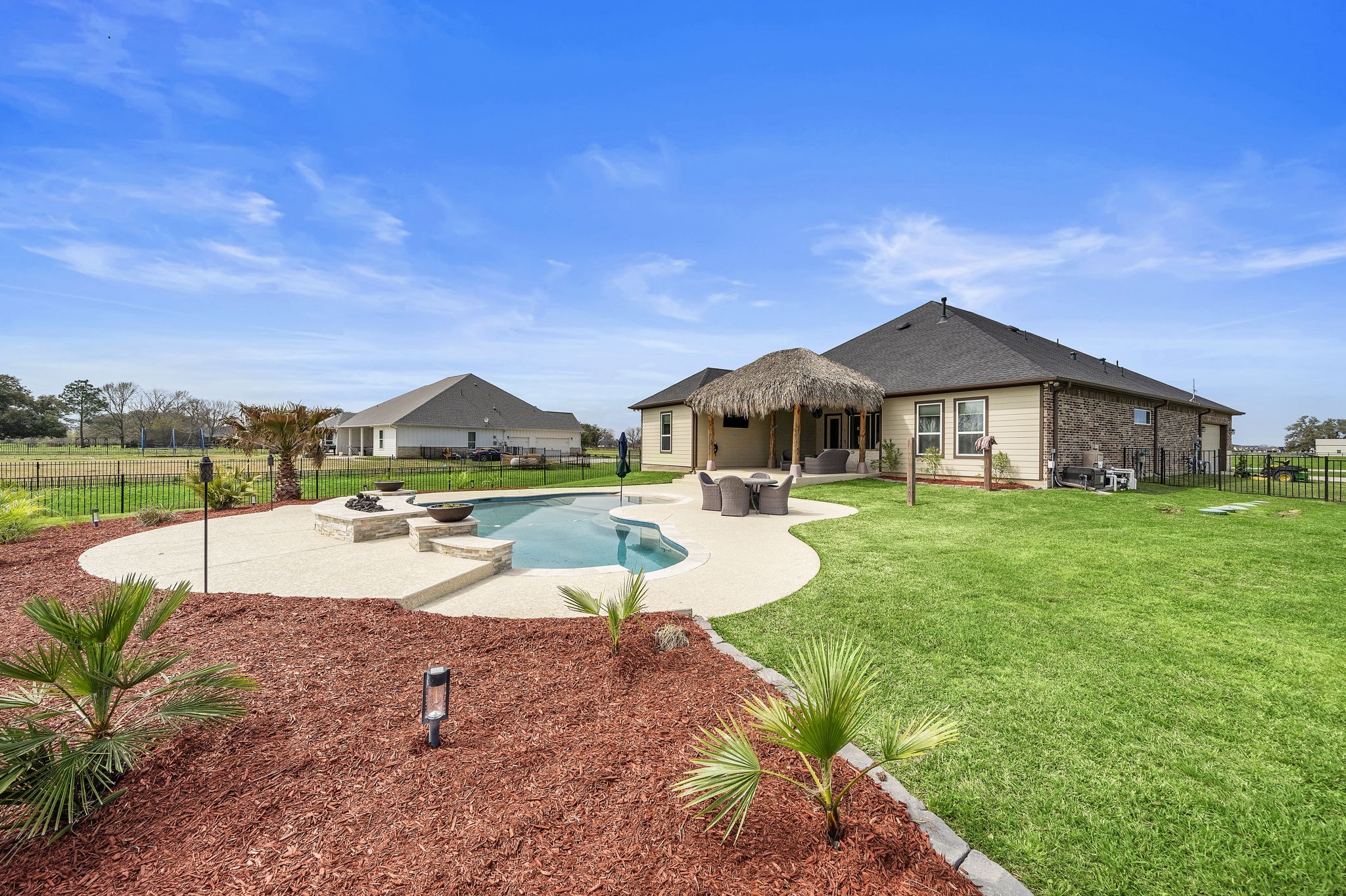 127 Cavalry Trail Drive Rosharon, TX 77583 - Photo 30 of 37 a view of a house with swimming pool and a yard