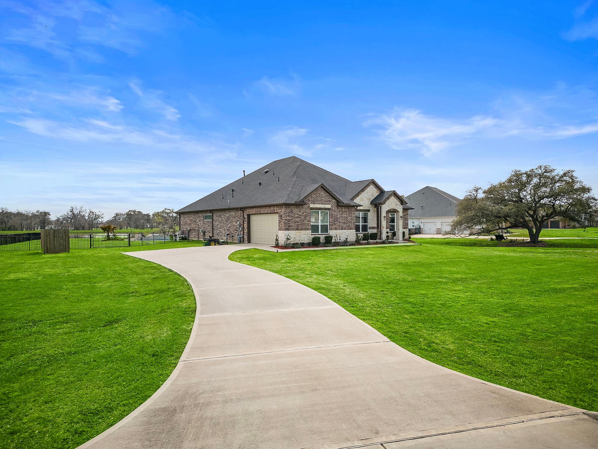 127 Cavalry Trail Drive Rosharon, TX 77583 - Photo 32 of 37 a view of a house with garden