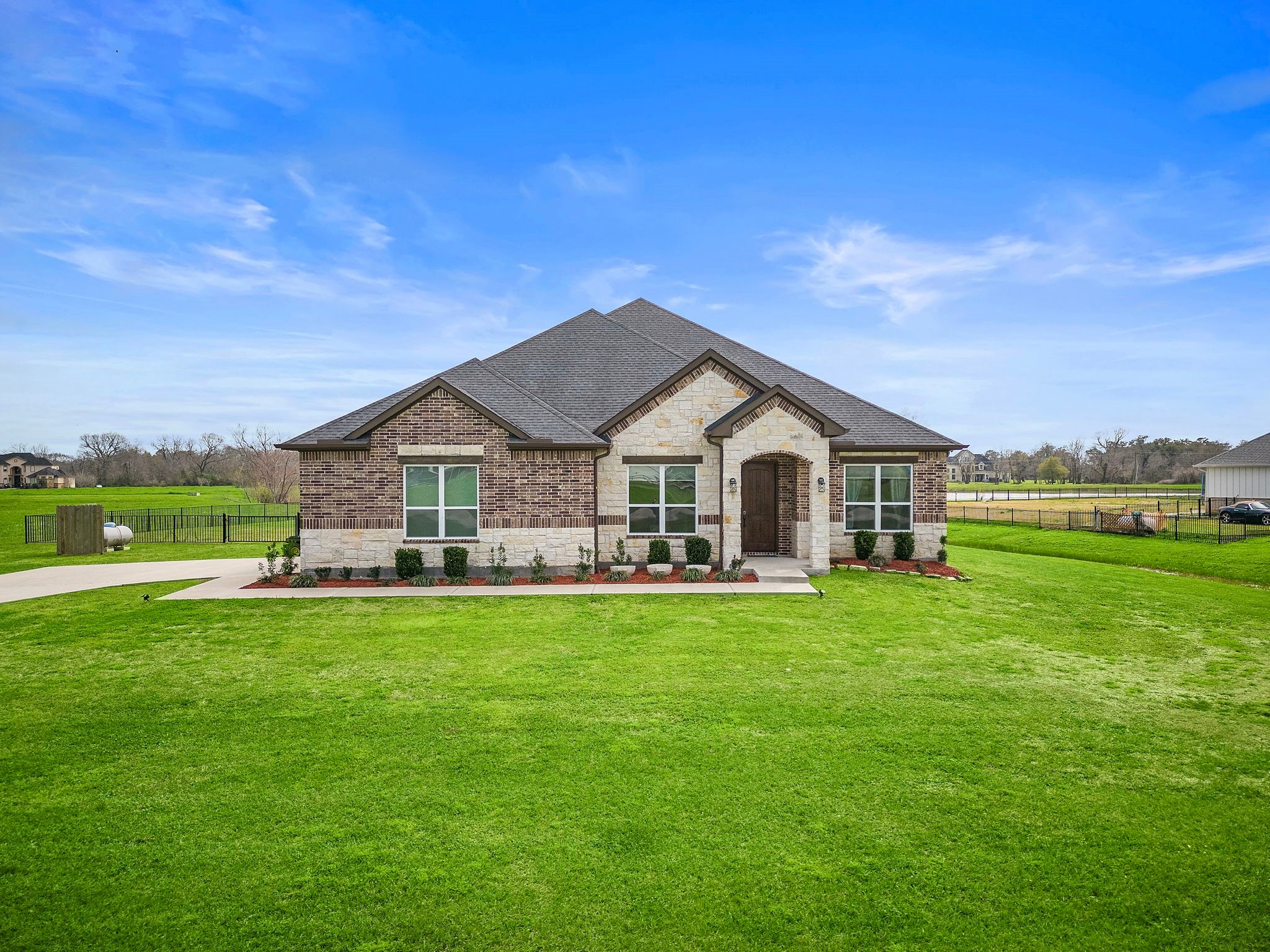 127 Cavalry Trail Drive Rosharon, TX 77583 - Photo 33 of 37 a view of a house with a big yard