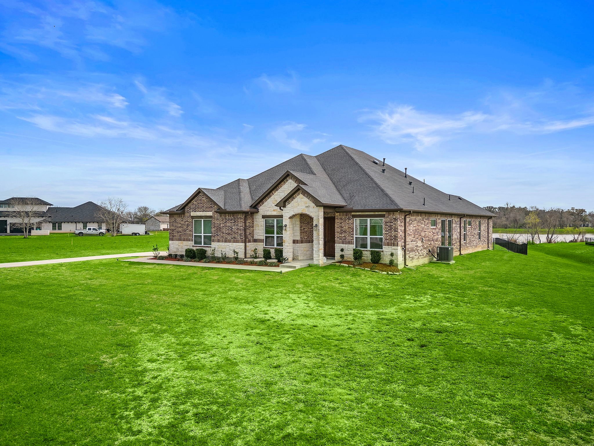 127 Cavalry Trail Drive Rosharon, TX 77583 - Photo 34 of 37 a view of a house with a big yard plants and large trees