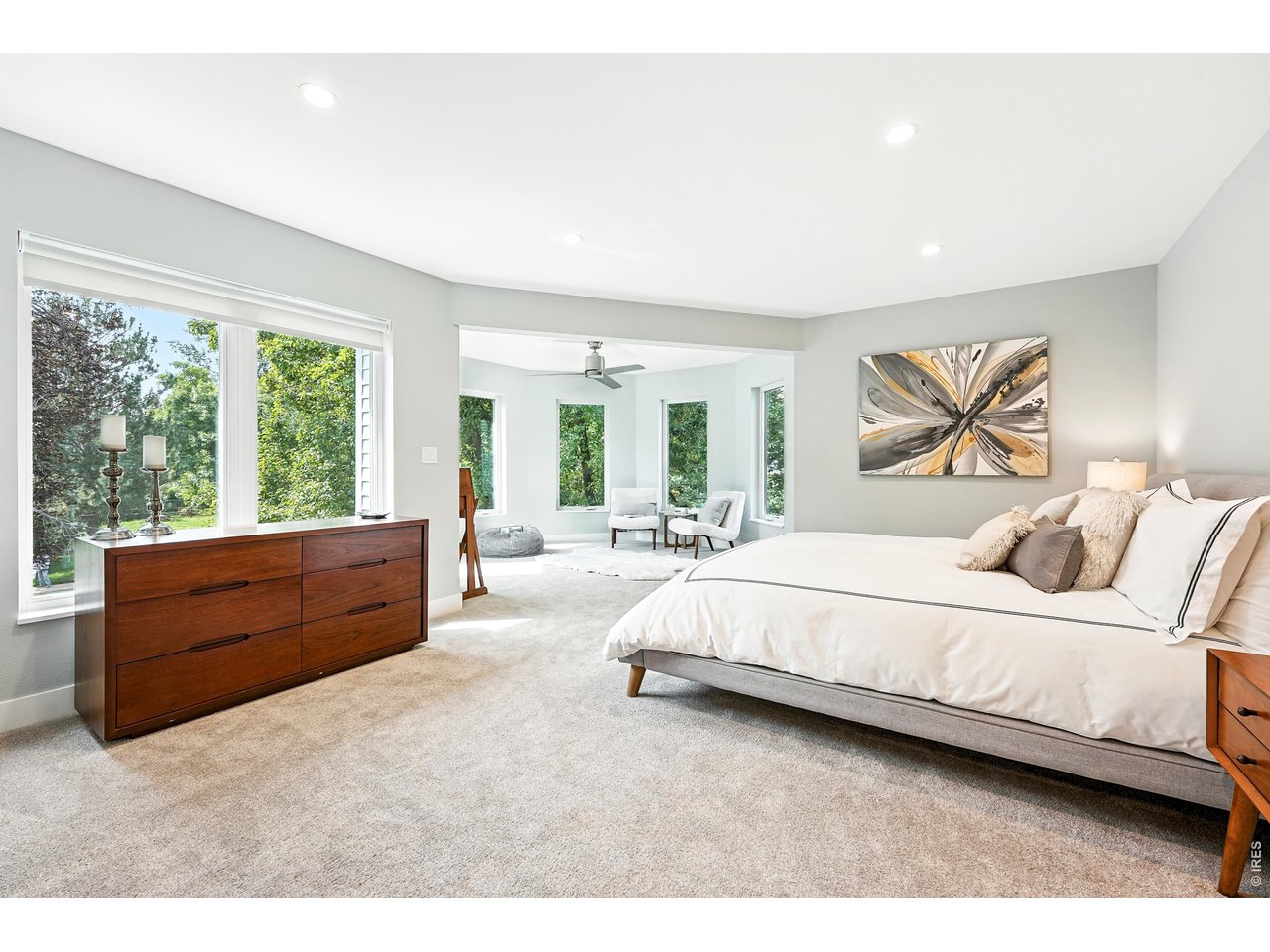 4557 Apple Way Boulder, CO 80301 - Photo 26 of 42 Upstairs, the primary bedroom feels like a true retreat, with soft natural light, peaceful views, and space to unwind at the end of the day.