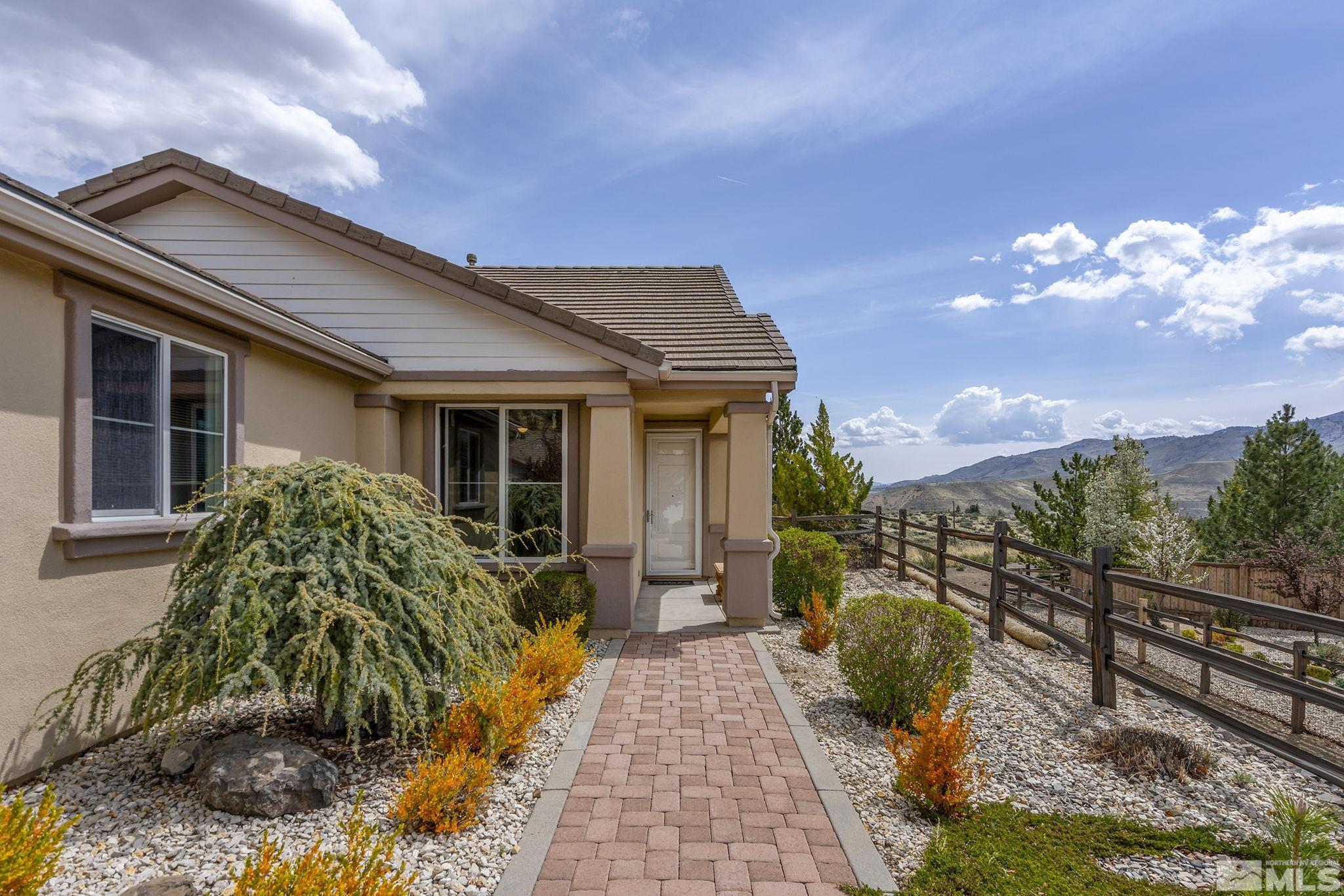 1210 Firefly Court Reno, NV 89523 - Photo 3 of 40 a front view of house with yard