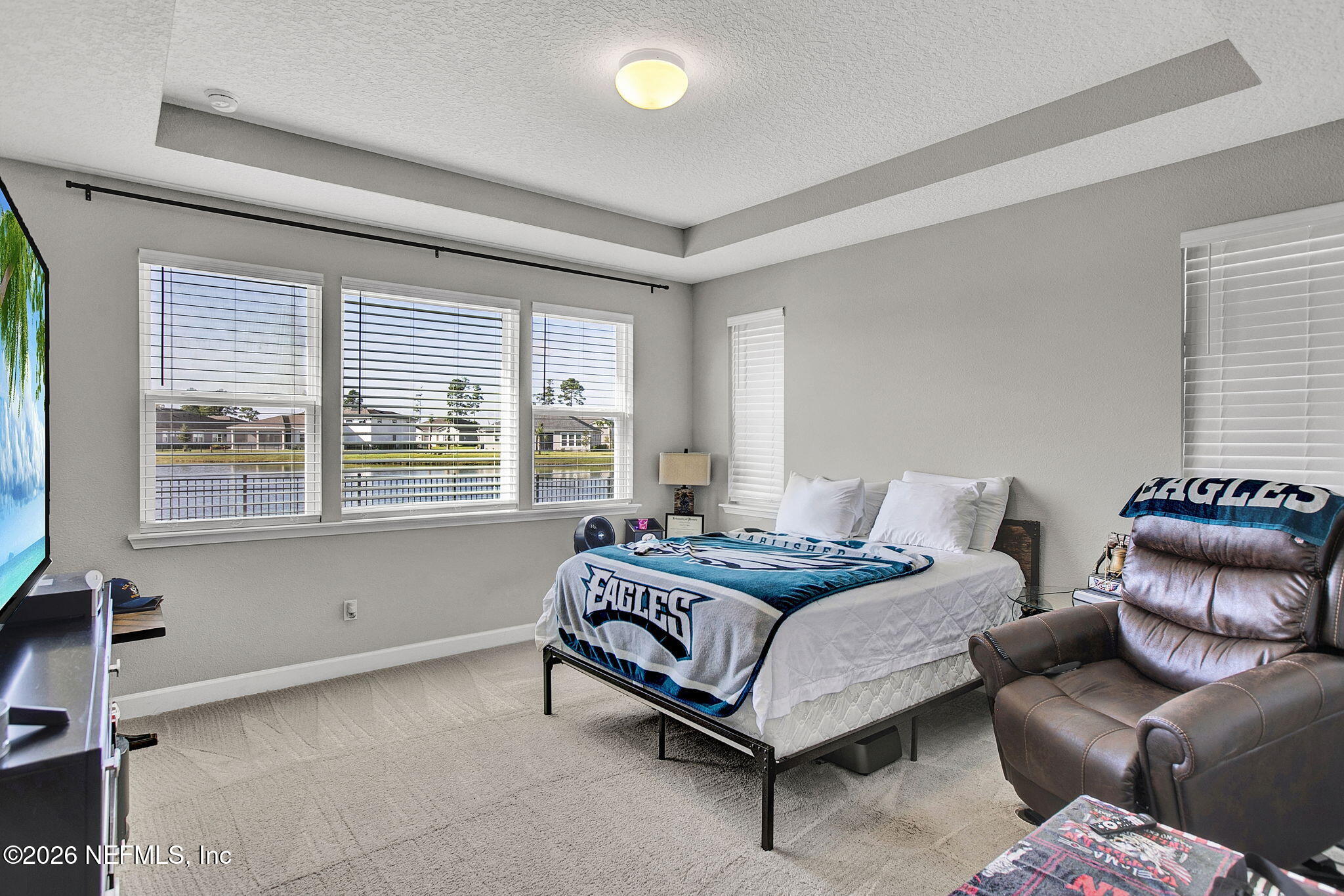 85401 Fall River Parkway Fernandina Beach, FL 32034 - Photo 20 of 38 a bedroom with a bed and a window