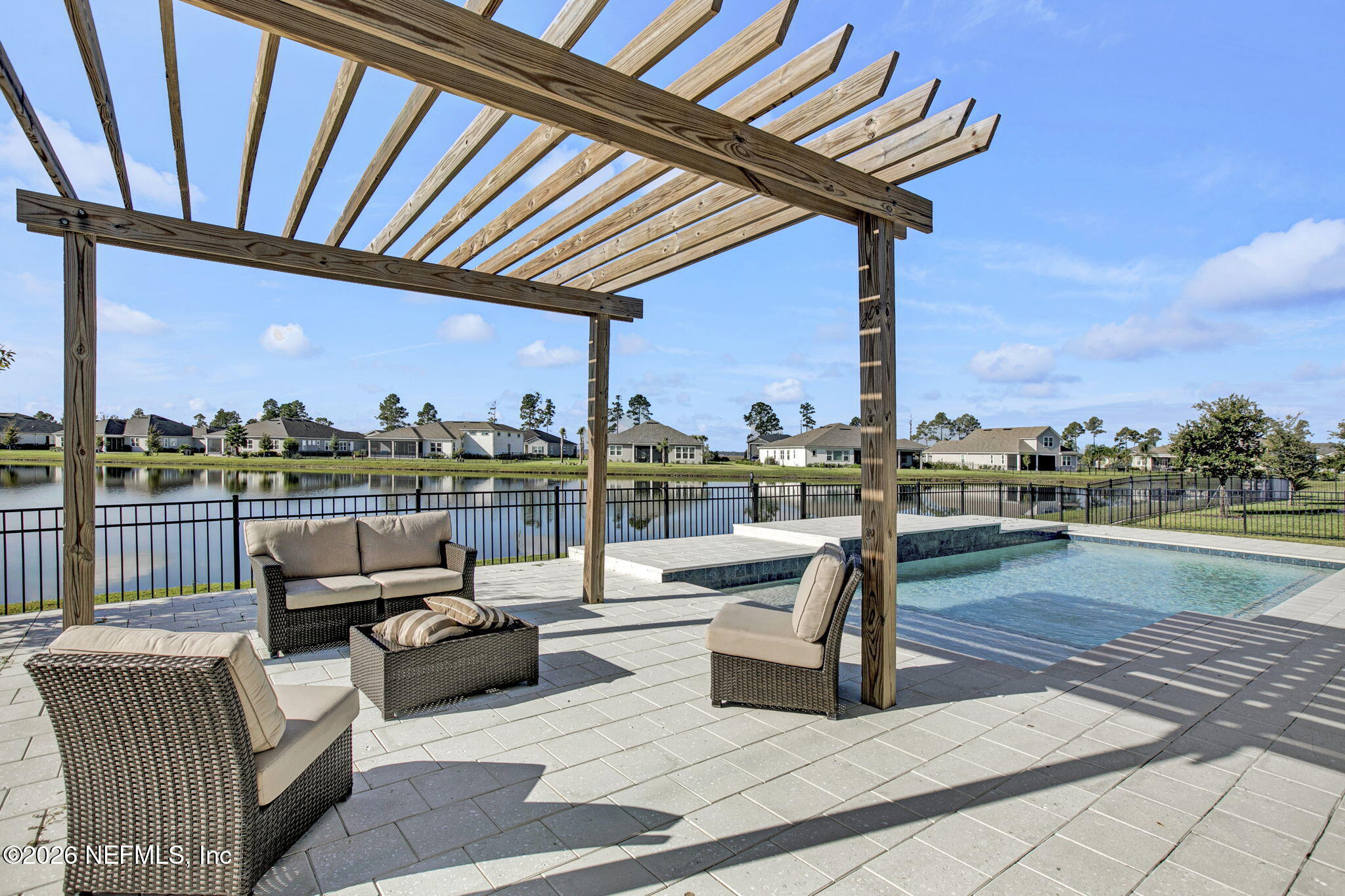 85401 Fall River Parkway Fernandina Beach, FL 32034 - Photo 2 of 38 a view of roof deck with couches and potted plants