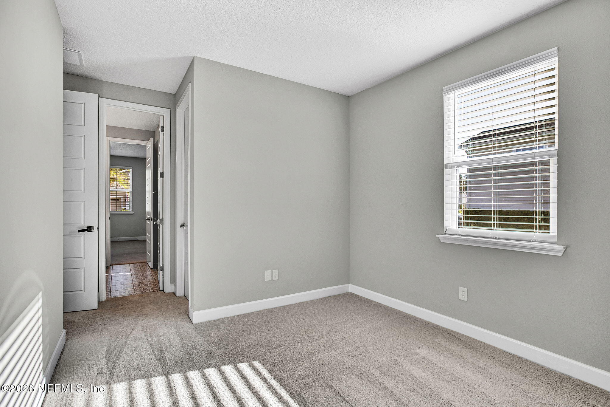 85401 Fall River Parkway Fernandina Beach, FL 32034 - Photo 25 of 38 a view of a room that has a window in it