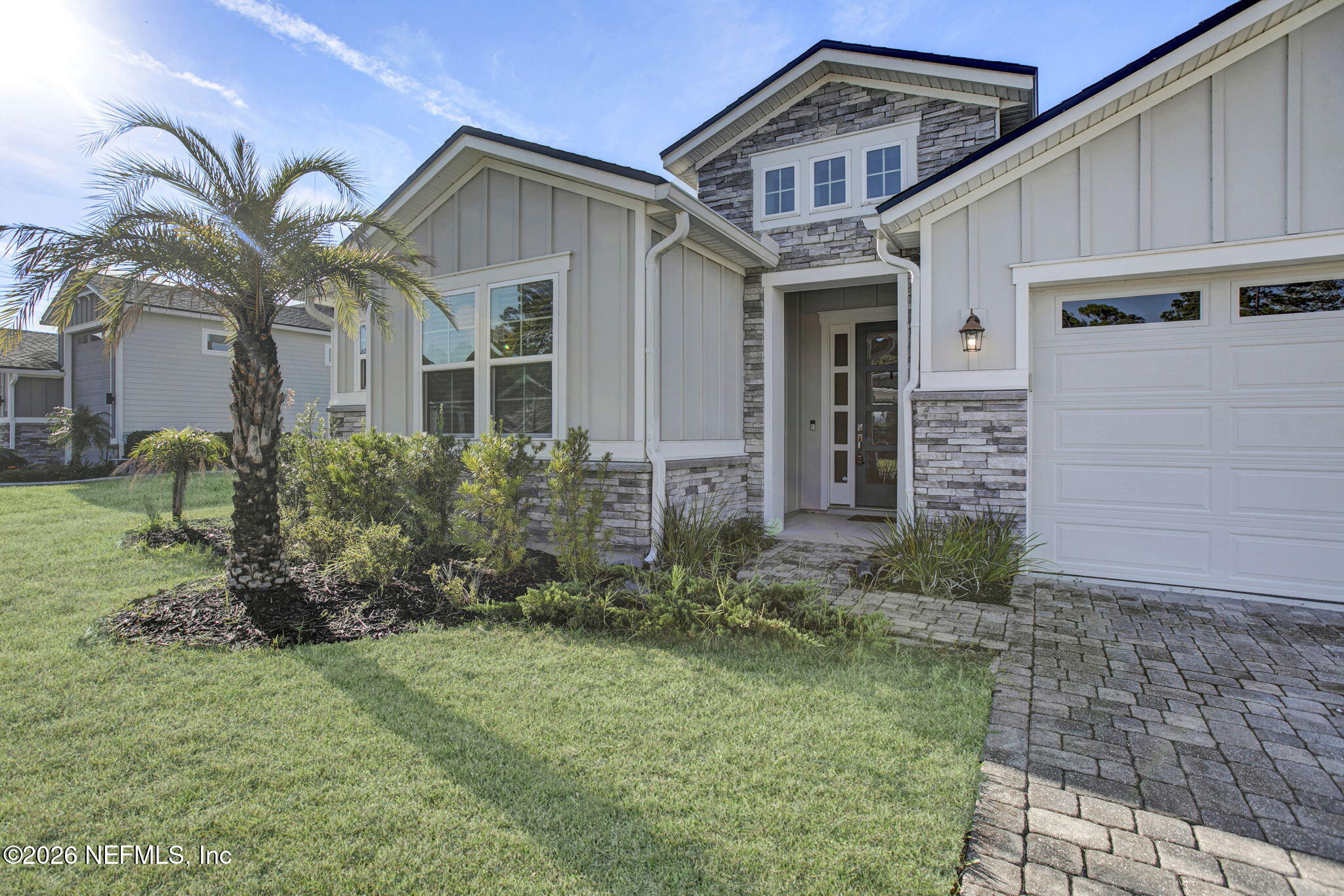 85401 Fall River Parkway Fernandina Beach, FL 32034 - Photo 37 of 38 a front view of a house with garden