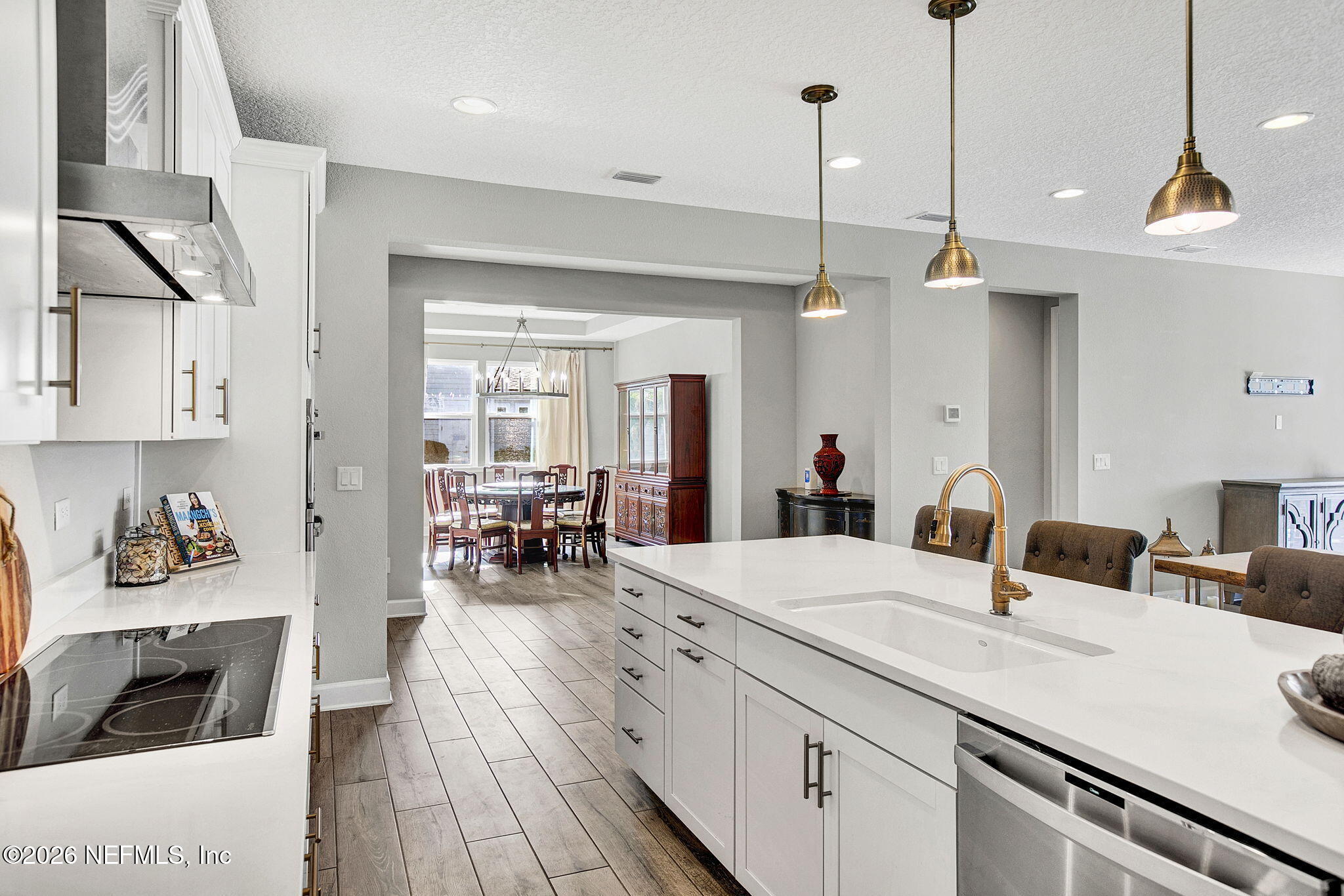 85401 Fall River Parkway Fernandina Beach, FL 32034 - Photo 5 of 38 a kitchen with sink and view of living room