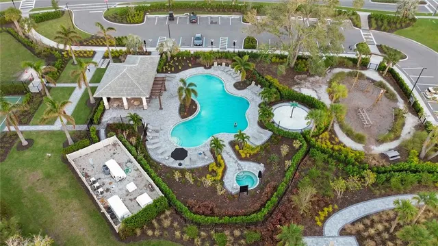 aerial view of a house with a swimming pool