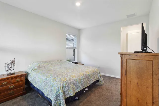 a bathroom with a shower and a bath tub