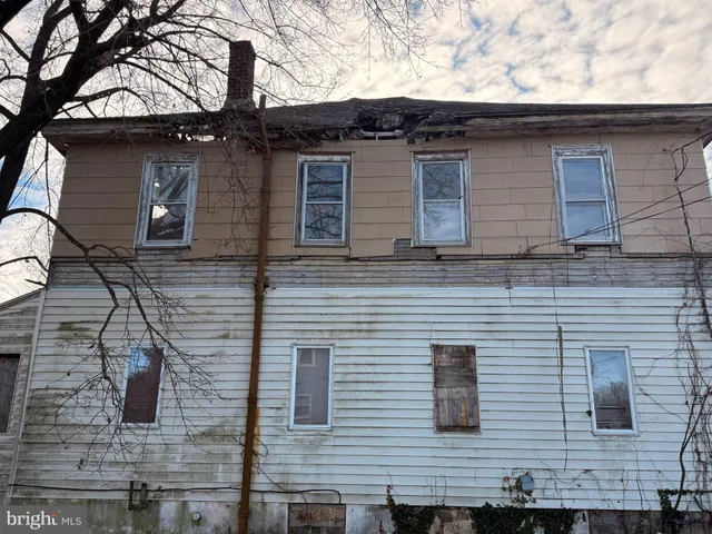 a front view of a house with garage