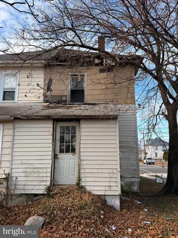 a front view of a house with a garage
