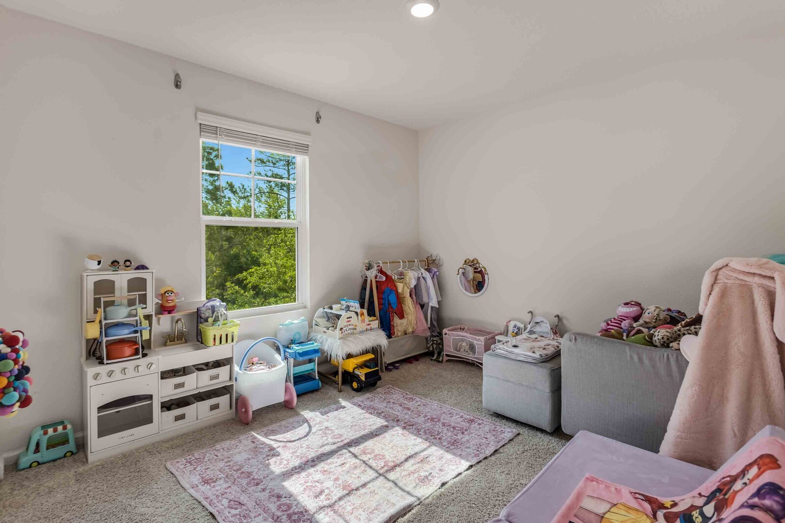 86784 Mainline Road Yulee, FL 32097 - Photo 16 of 25 a room with toys and a wooden floor