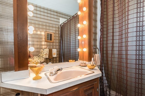 39 Farmcrest Avenue Lexington, MA 02421 - Photo 16 of 26 a bathroom with a sink and a mirror