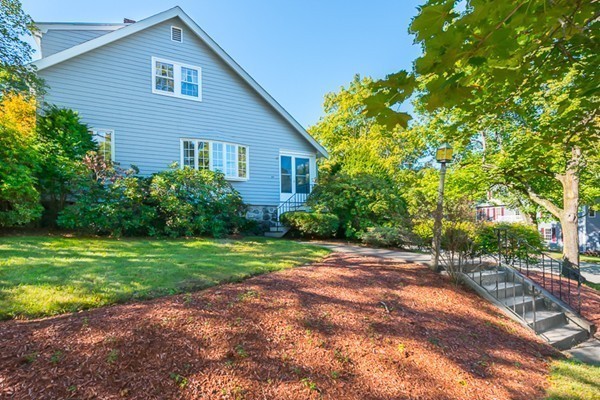 39 Farmcrest Avenue Lexington, MA 02421 - Photo 23 of 26 a front view of a house with garden