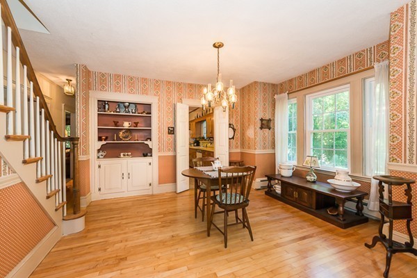 39 Farmcrest Avenue Lexington, MA 02421 - Photo 5 of 26 a living room with furniture and a floor to ceiling window