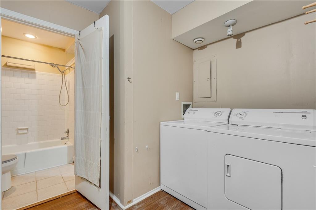 134 Lablanc Way Northwest Atlanta, GA 30327 - Photo 25 of 42 a utility room with dryer and washer