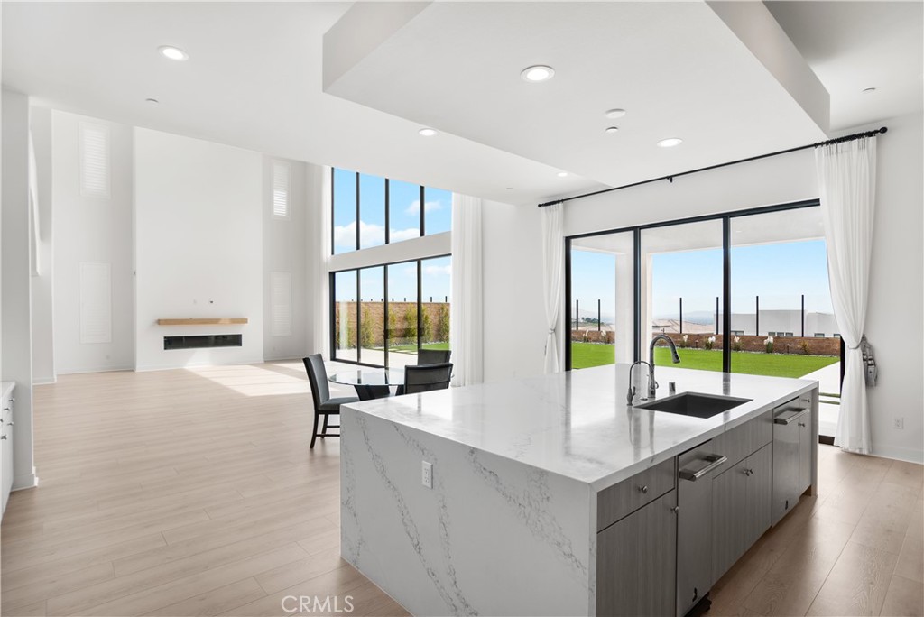 11734 Hillsborough Lane Porter Ranch, CA 91326 - Photo 13 of 34 a living room with furniture and a large window