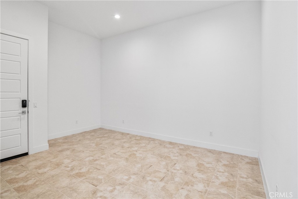 11734 Hillsborough Lane Porter Ranch, CA 91326 - Photo 15 of 34 an empty room with an entryway